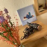 By The *